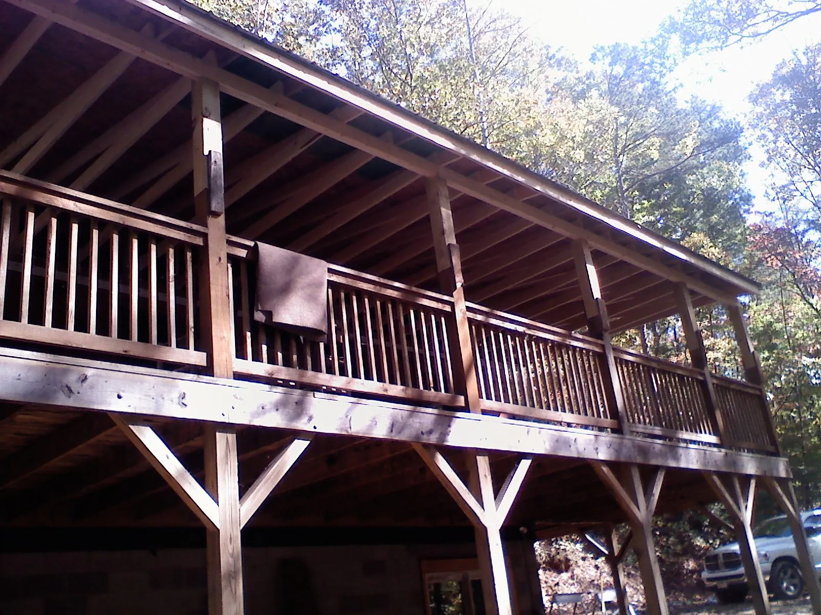 Timber framing under a new elevated porch and deck — Roof Leak Repair in Oak Brook by Roofing Brothers